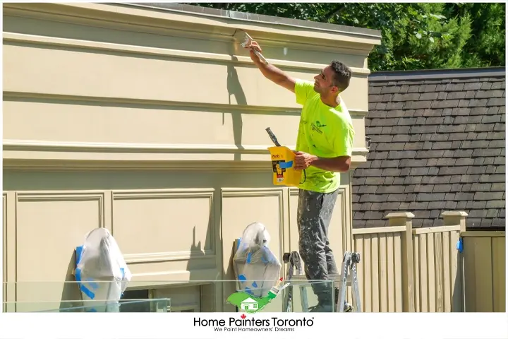 Painter on High Ladder