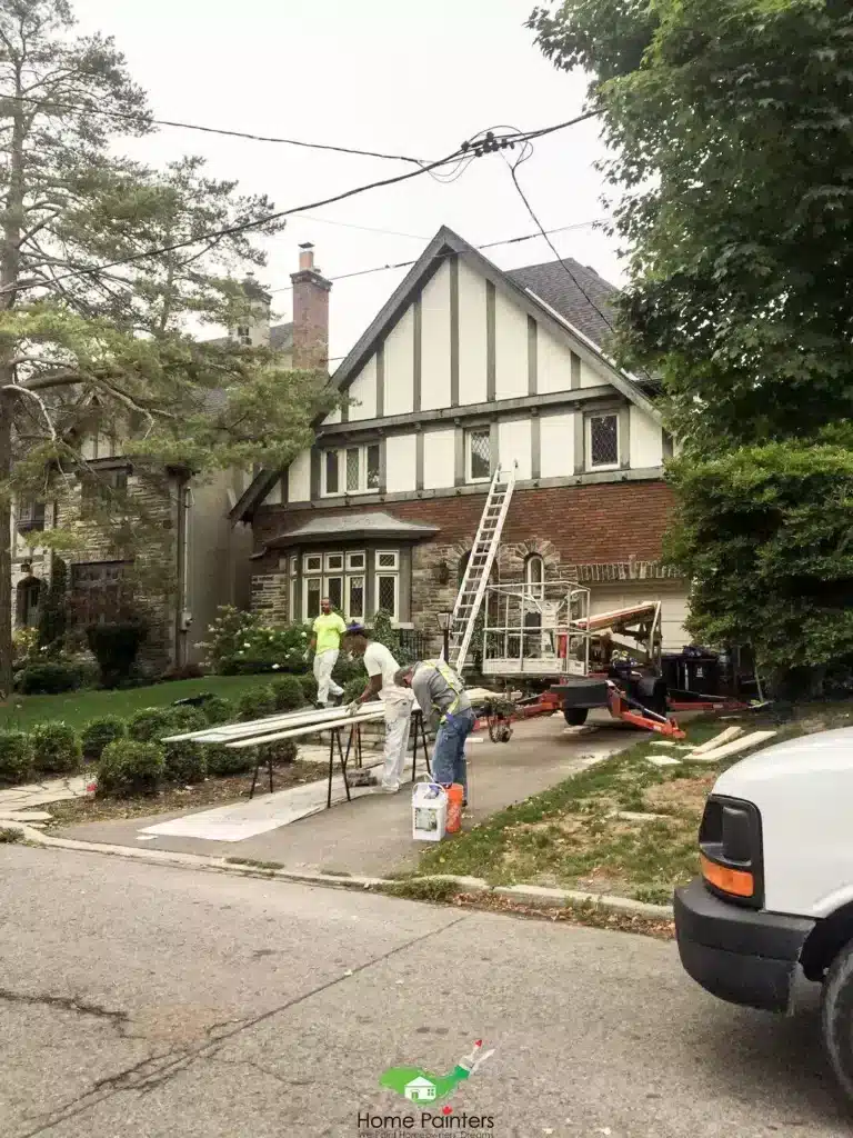Exterior painting tudor house handyman carpentry Home Painters Toronto in action