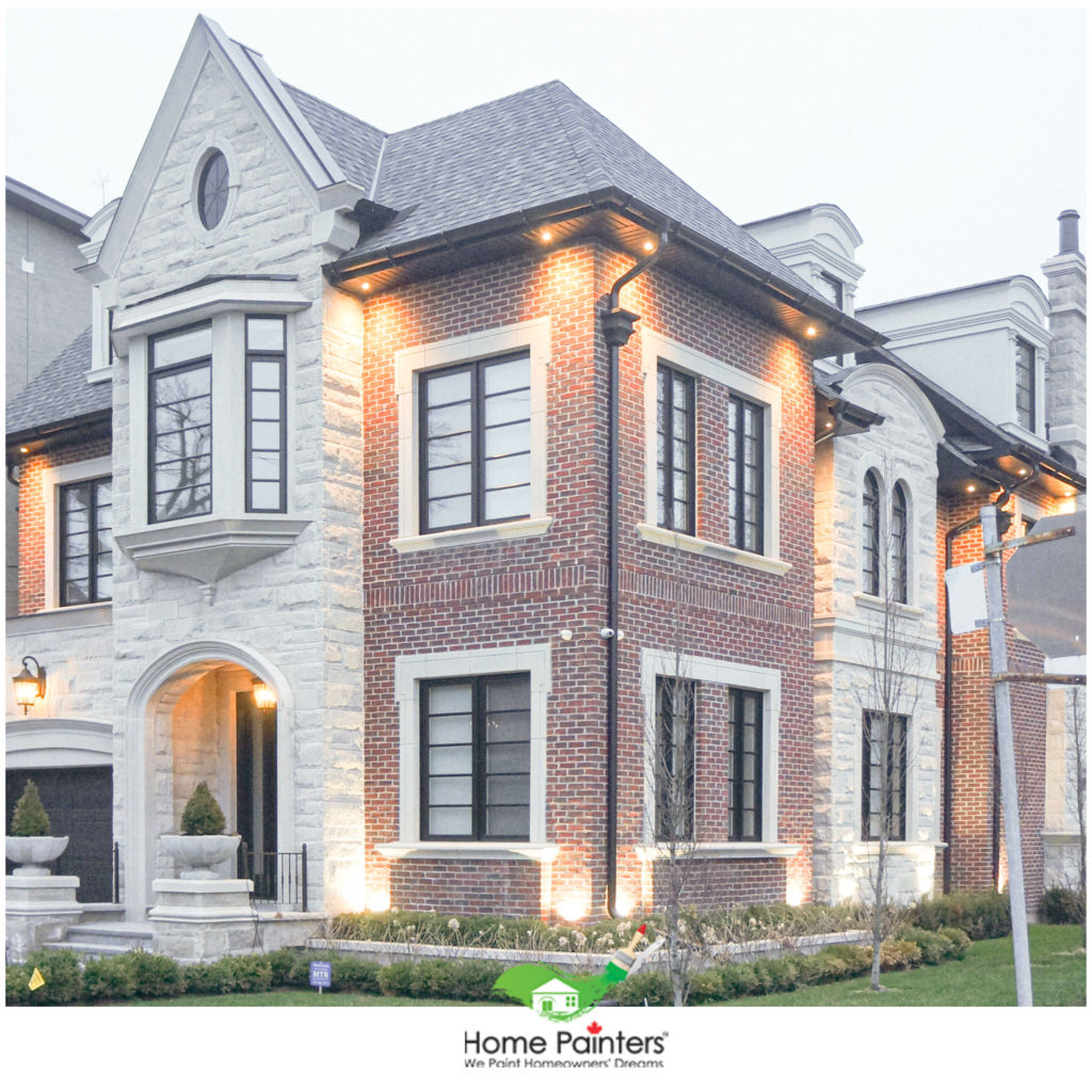 red brick house with stone archway, red brick house staining by local toronto home painters, the cost to paint a brick house, painting exterior brick, exterior house painters, home painting services, exterior painters