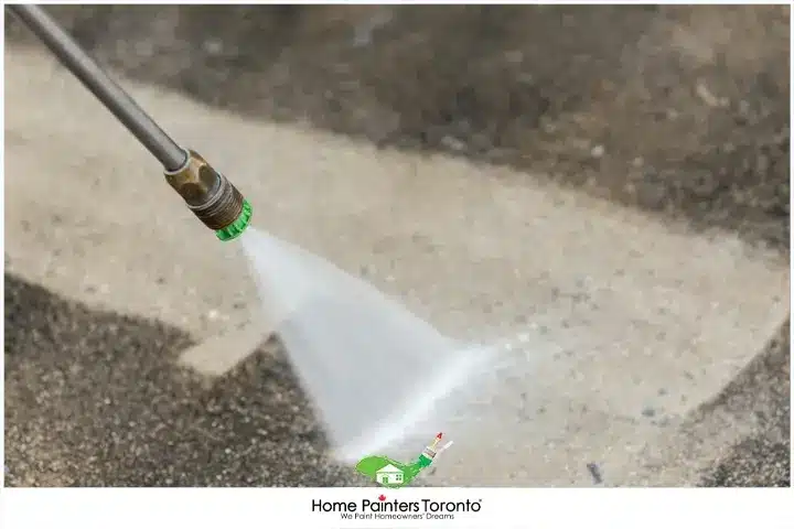 painter cleaning concrete floor