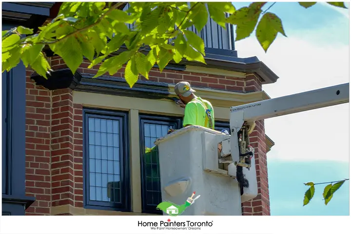 exterior painting in cherry picker
