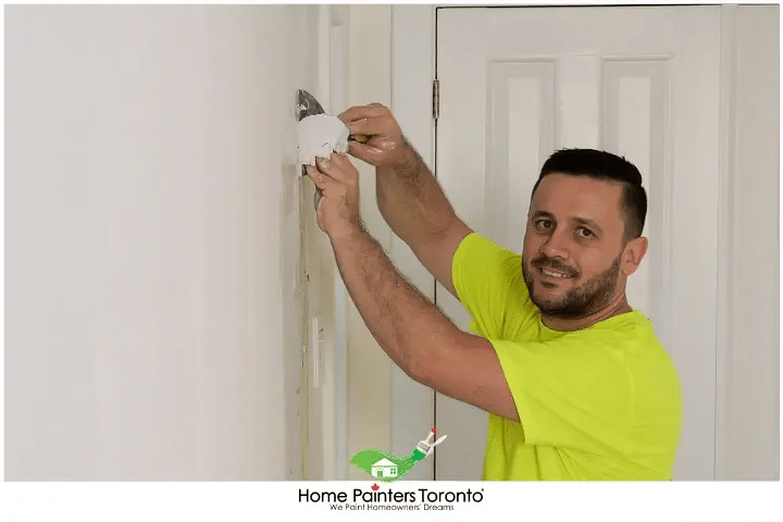 Painter Stripping The Paint