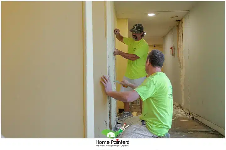 Painter Repairing Drywall