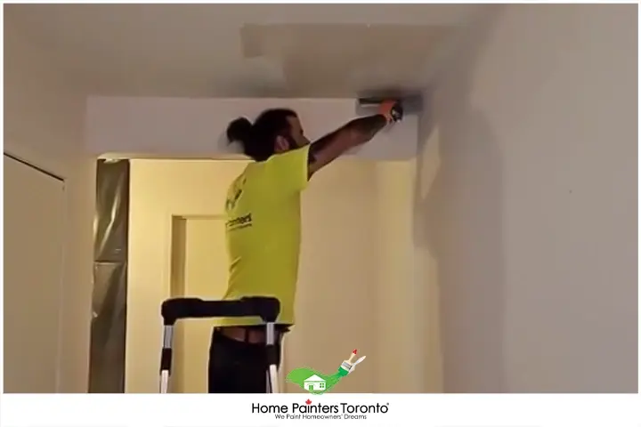 Painter Repairing Ceiling
