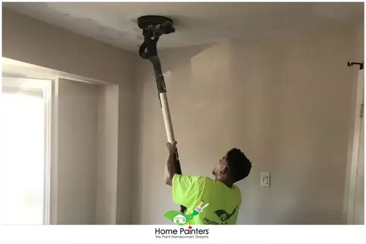 Painter Repairing Stucco Ceiling