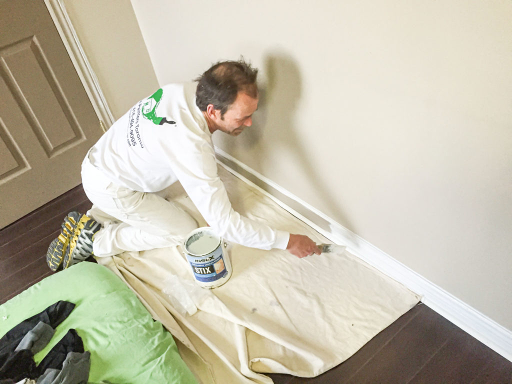 Painter edging painting wood shoe moulding white painting company Toronto, Painting costs per square foot canada, Interior painting cost per sq ft, how to install shoe moulding, paint cost per square foot