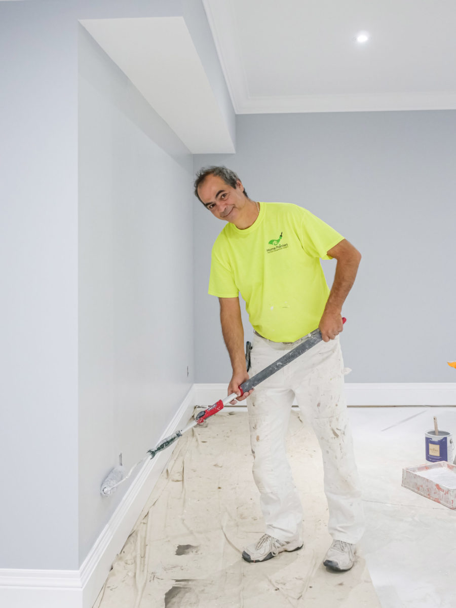 professional home painter painting condo, how much does it cost to paint wood trim in toront