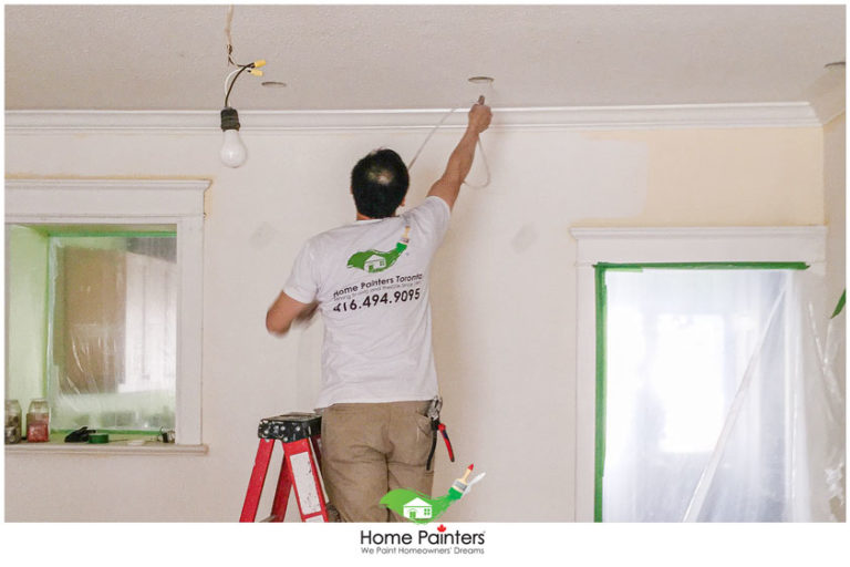 handyman fixing ceiling after a popcorn removal, painting stucco ceiling, how to paint stucco ceiling, how to paint a textured ceiling, ceiling paint peeling