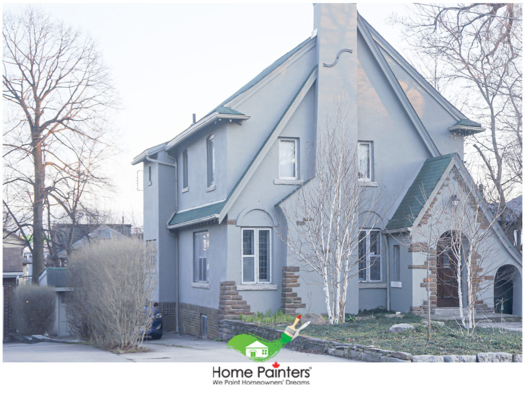 brick house with siding with gray exterior paint done by professional painters at home painters toronto