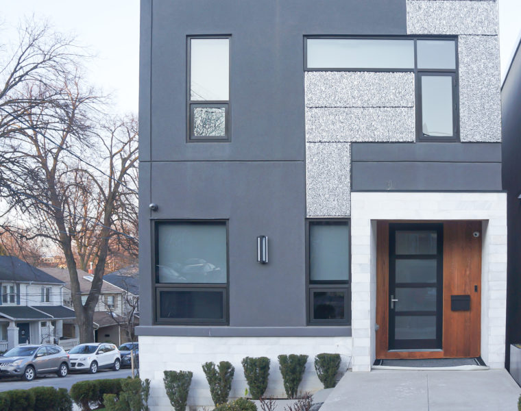 exterior painting grey residential house downtown by Toronto painting company