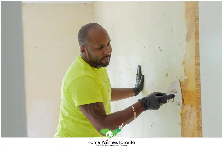 Painter Scraping Wallpaper