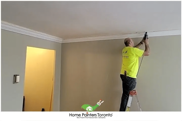 Painter Repairing Crown Moulding