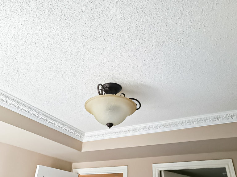 lamp is hanging on ceiling after stucco ceiling repair and painting, removing stucco ceiling, popcorn ceiling, popcorn ceiling removal, house painters toronto, painting companies toronto, stucco repair, how to remove stucco ceiling, painting stucco ceiling, how to paint stucco ceiling