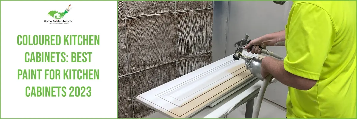 painter spraying kitchen cabinet