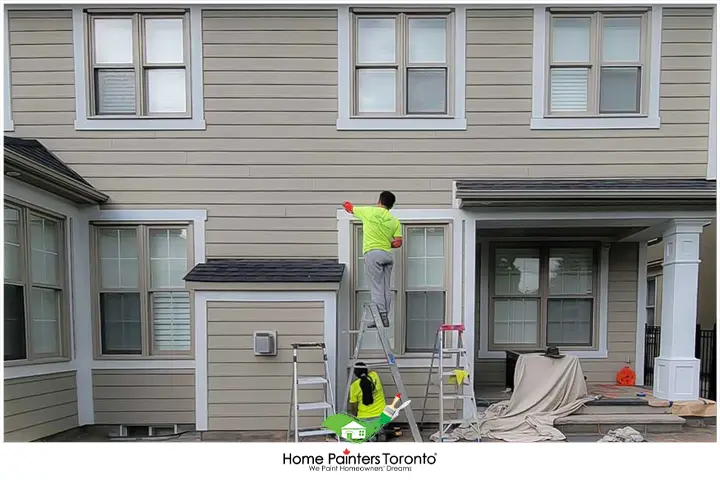 Painters Painting Aluminum Siding