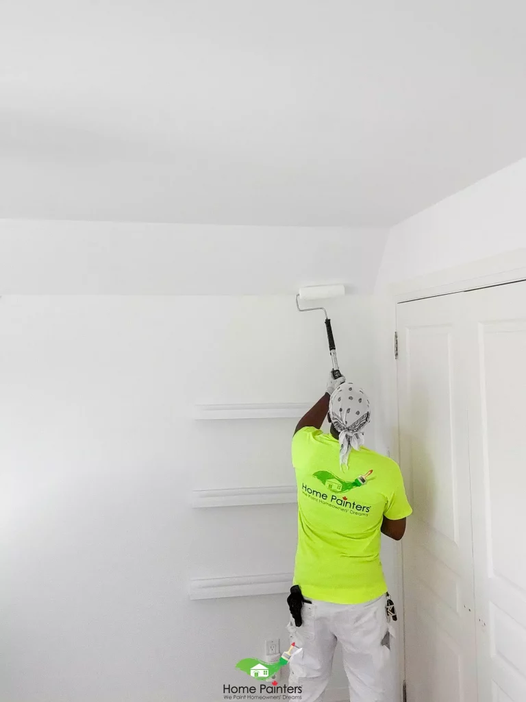painter painting interior wall