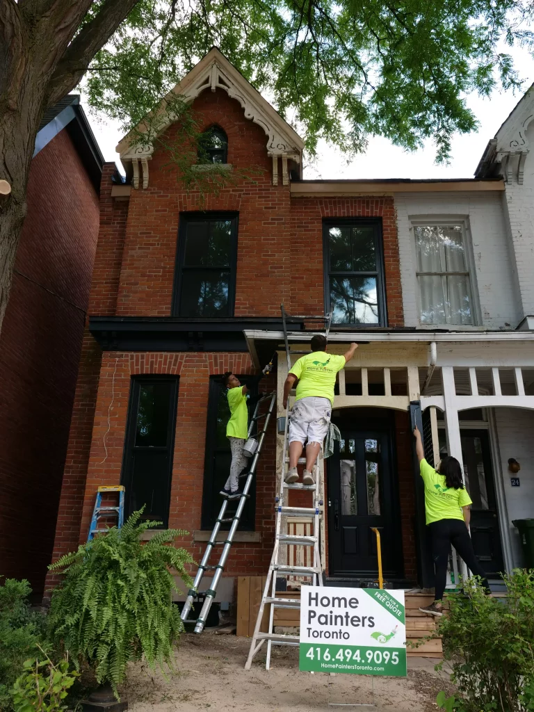 Painter painting exterior porch