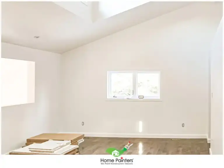 Living room of a house with clean white paint and new flooring, interior painting, toronto painting, toronto house painters, painting services, interior house painters, interior painters near me, paint for living room, interior room painting