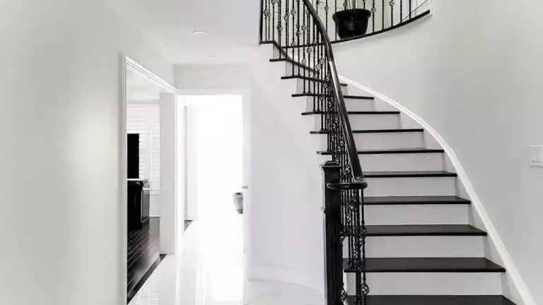 Interior Painting Hallway Stairs white trims and dark brow stairs classic by Home Painters Toronto