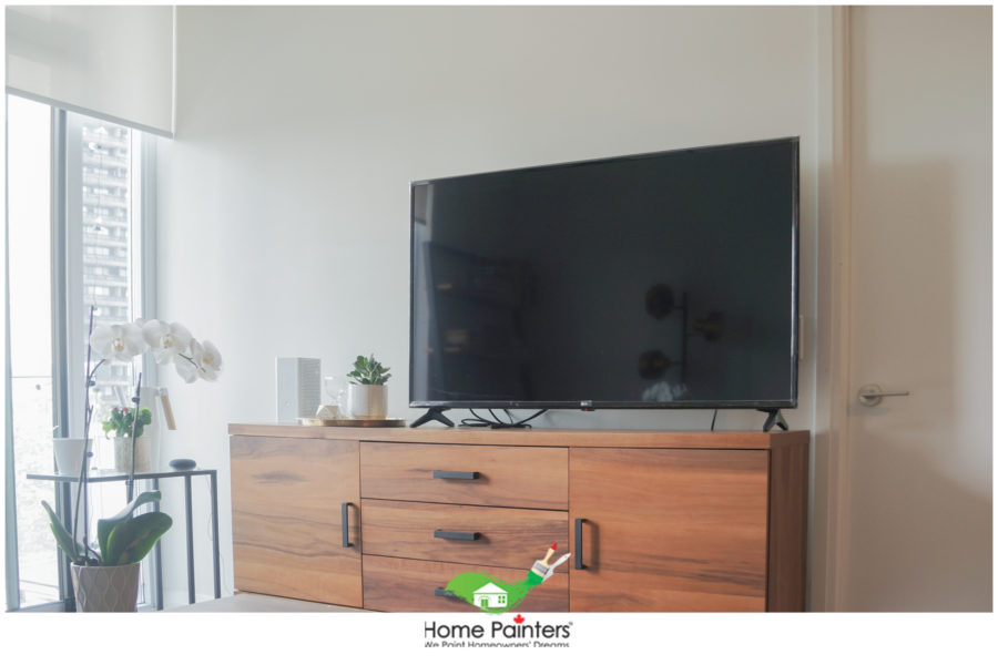 interior-painting_condominium_white_condominium-livingroom-with-oak-table-with-tv-e1597929523132