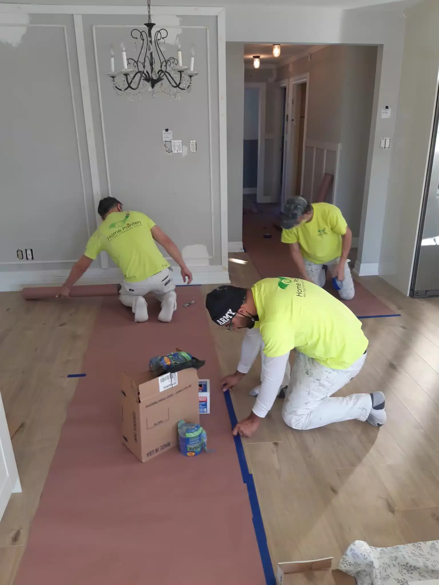 painters preparing the room for painting