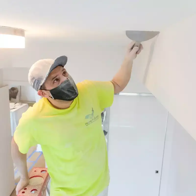 popcorn ceiling removal scraping with a scraper