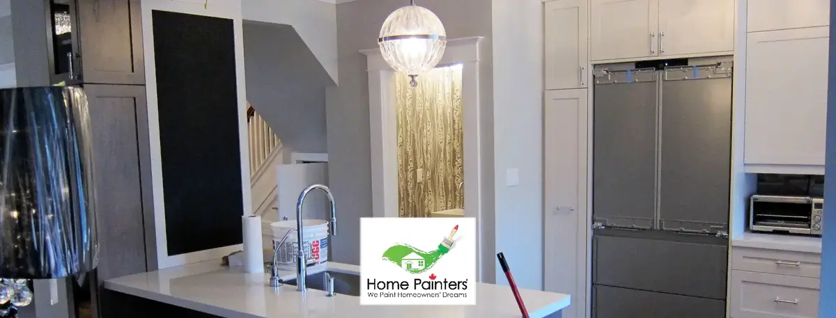 painting Kitchen cabinets white by painting company toronto
