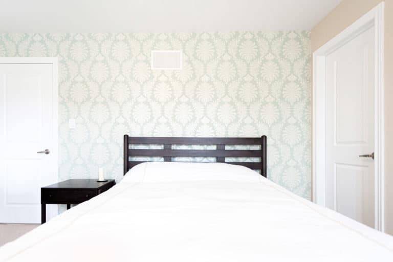 Green Wallpaper Accent Wall in Bedroom