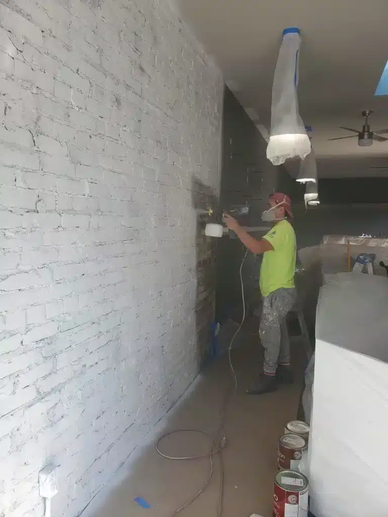 home-painters-spraying-wall