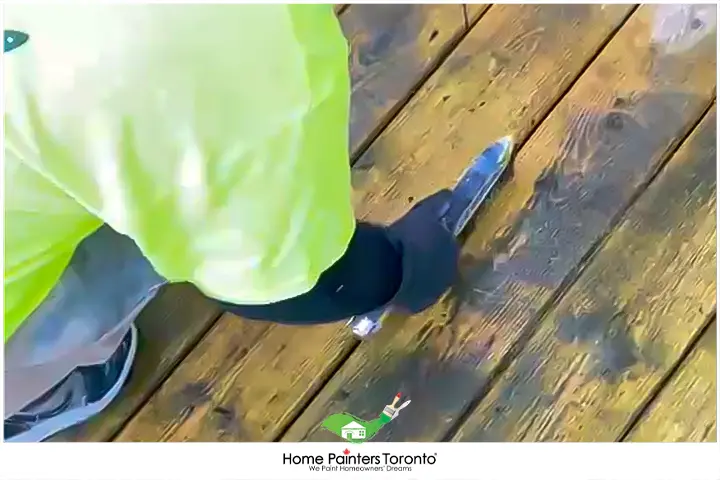Painter Cleaning Wood