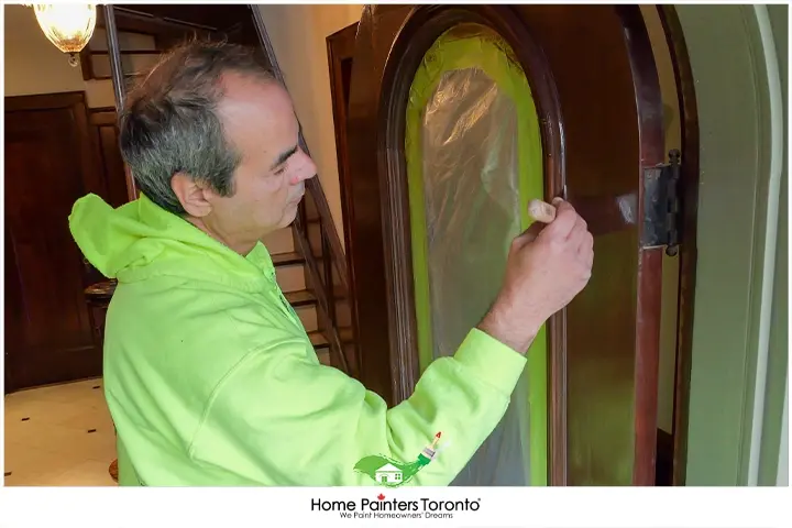 Painter Painting A Stained Wood