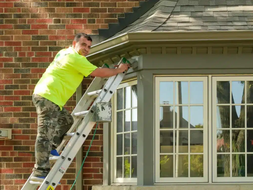 Painter Painting Exterior Window Trim