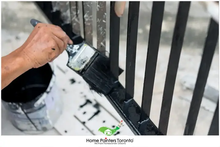 Painter Painting Iron Fence