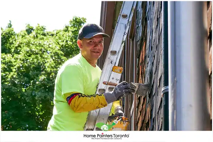 Painter Painting Wood Siding