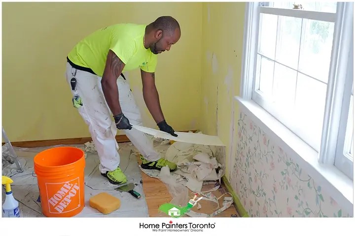 Painter Removing Wallpaper