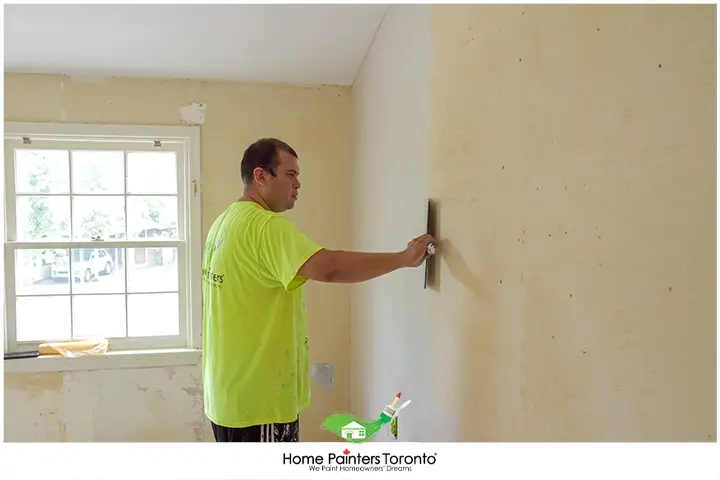 Painter Scraping Wallpaper