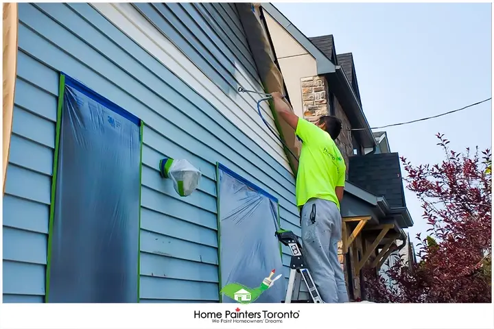 Painter Spray Painting Vinyl Siding