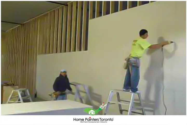 Painters Installing Walls