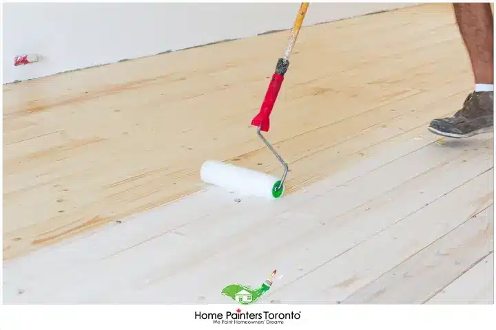 Painter Painting Hardwood Floors
